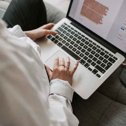 person using a mac book pro