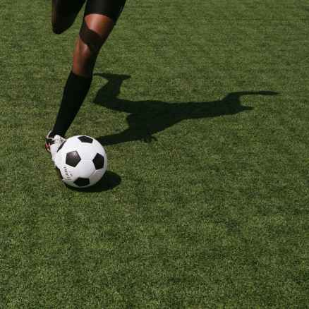 anonymous soccer player on field during match