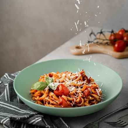 delicious spaghetti with bolognese sauce and parmesan cheese